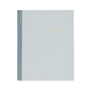A flat monthly planner with a blue pinstripe pattern with '2027' stamped on cover in gold foil with a dusty blue tape binding