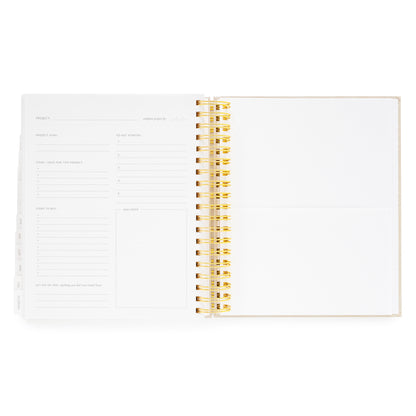 Open daily spiral planner to project page with project goal, items i have for project, items to buy, let go of, to get started and notes/sketch and white pocket for keepsakes