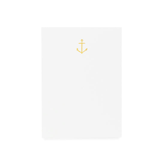 White notepad with gold anchor foil stamped on it