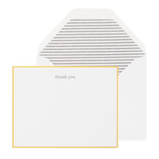A white note set featuring a square card with a thin gold border and the words 'thank you' in small gray text, paired with a white envelope that has gray horizontal stripes inside.
