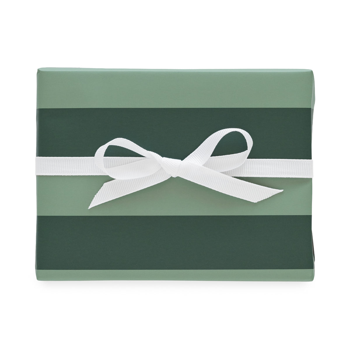 Mint and dark green wrapping paper wrapped on a gift with a white ribbon