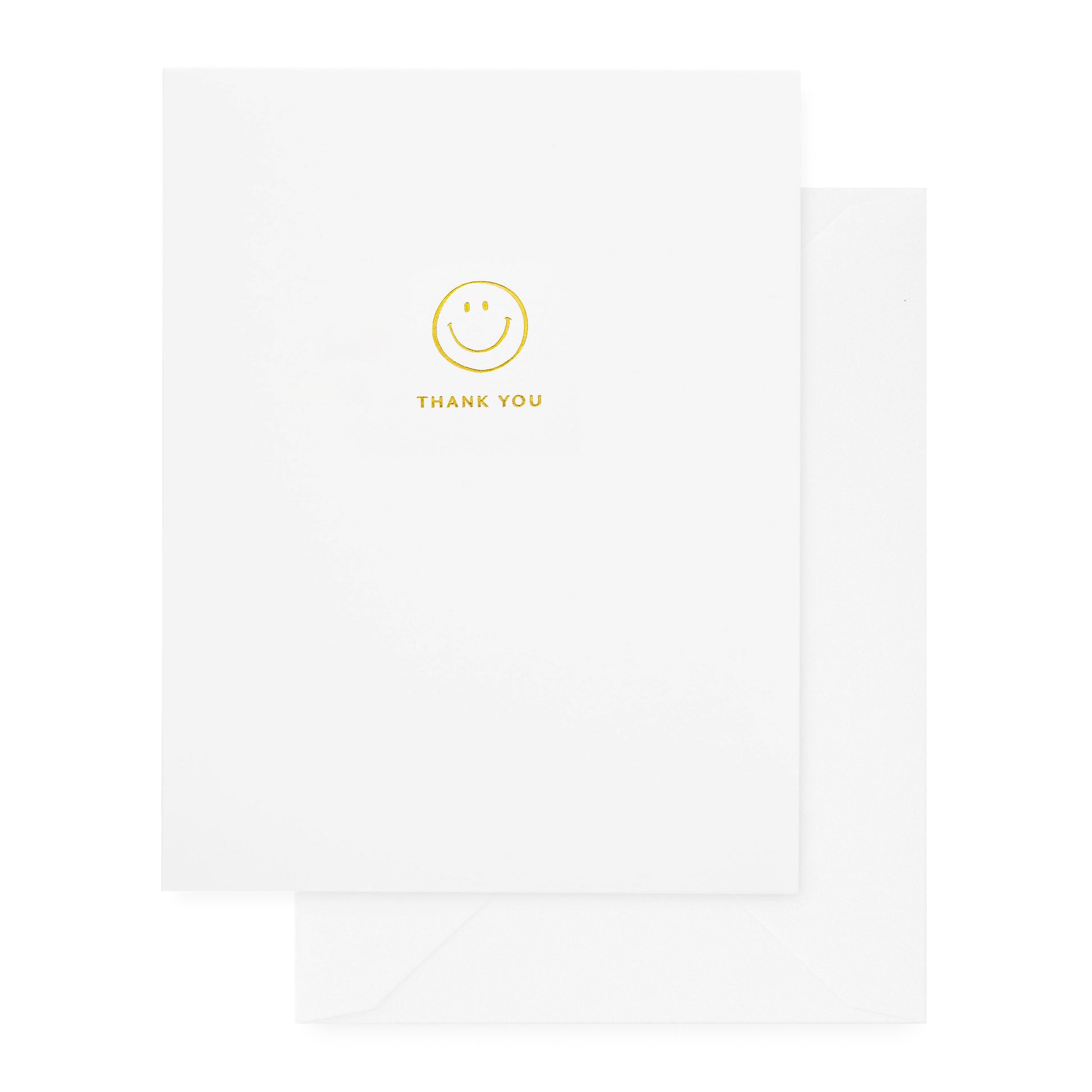 white card with gold foil smiley and thank you text, white envelope